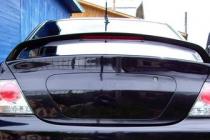 Декоративная заглушка крышки багажника на Lancer IX